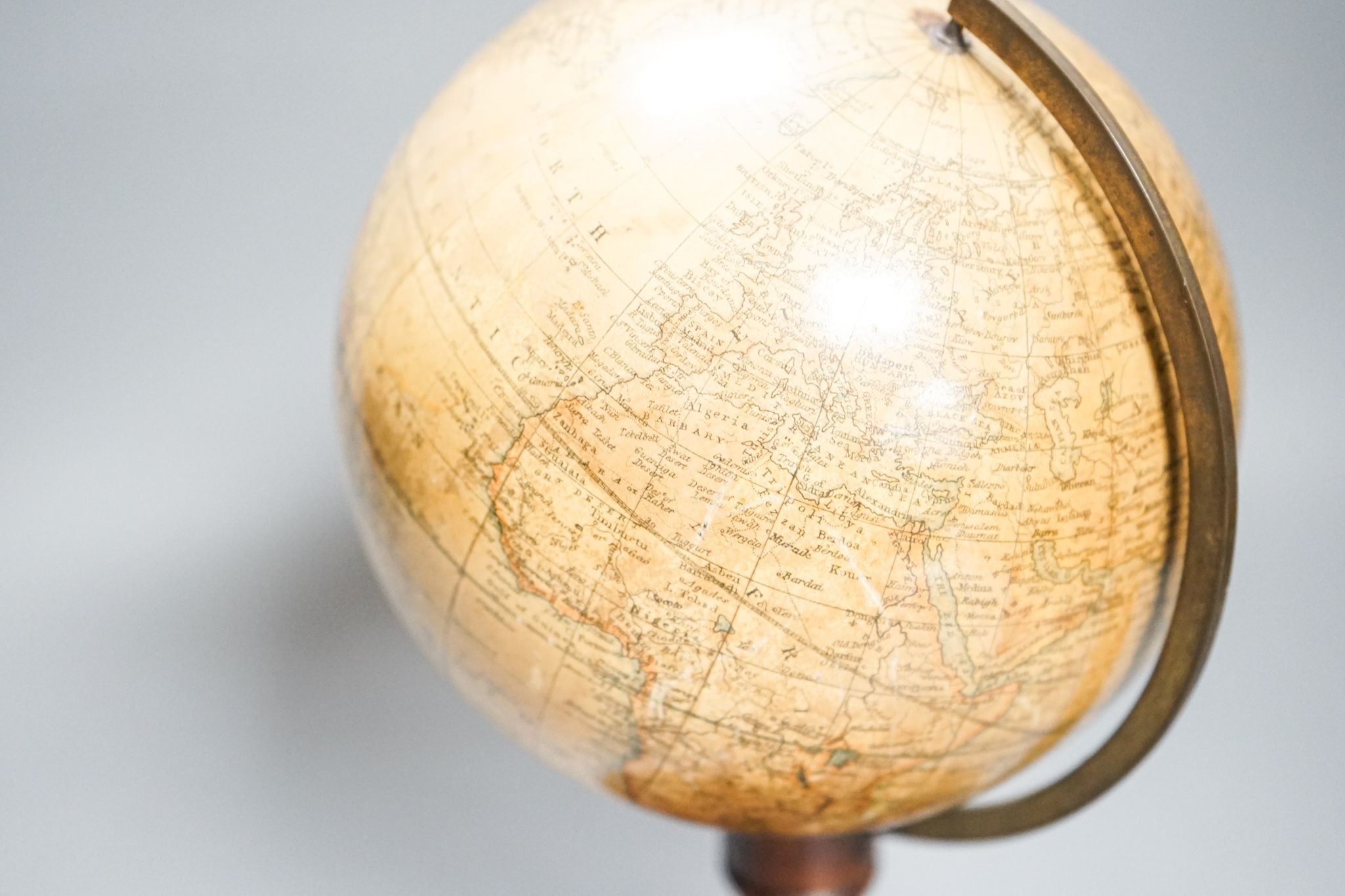 A Victorian Smith’s 5.5in. terrestrial globe, turned mahogany stand, 24cm